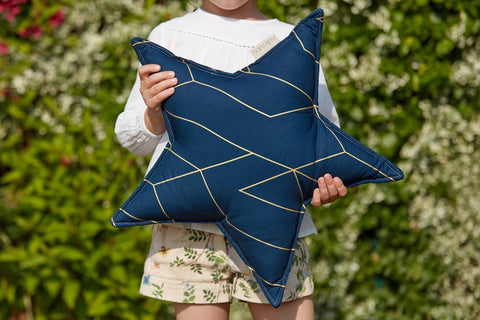 Cuscino stella linee dorate su blu scuro