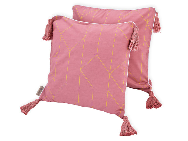 Linee dorate sulla fodera del cuscino rosa