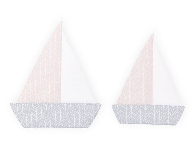 Modello di piume bianche per barche a vela su rosa